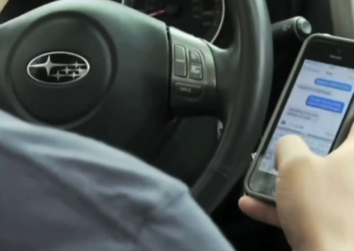 800,000 Drive While Using Handheld Phone