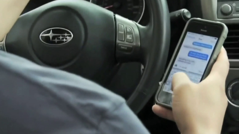 800,000 Drive While Using Handheld Phone